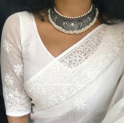 Elbow-Length Sleeves BlouseMore traditional look, common in South India.