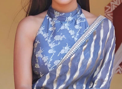 Halter Neck BlouseSleeveless, neck-tied style — great for fusion or party sarees.
