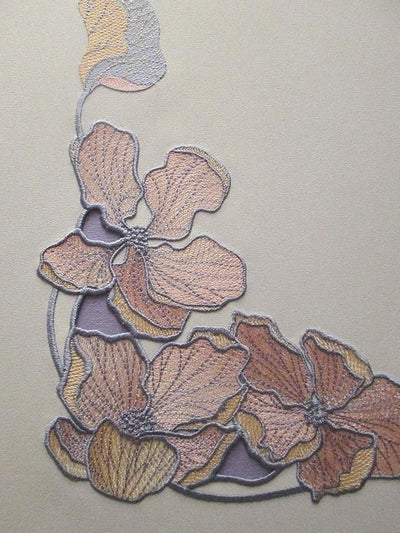 Appliqué WorkDecorative fabric pieces sewn onto blouse for texture and pattern.