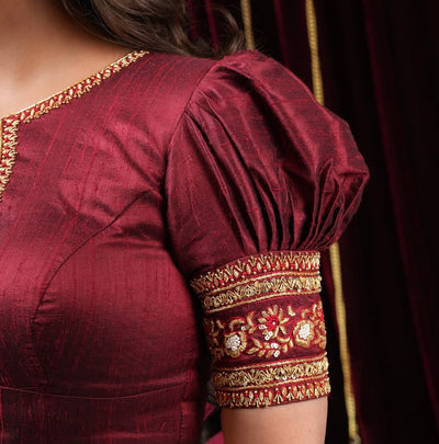 Puffed SleevesPuffy, gathered sleeves giving a vintage or royal look.