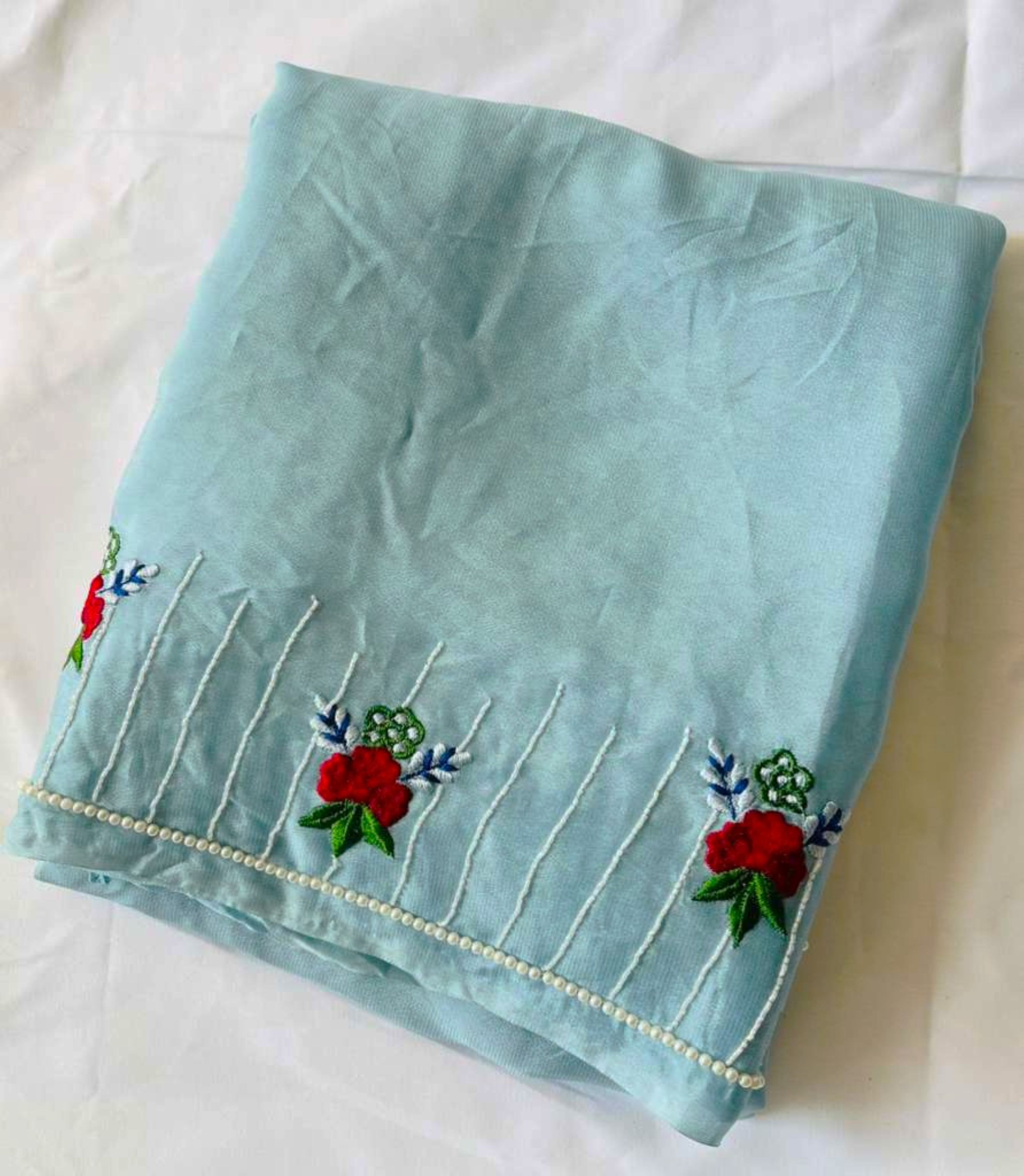 Hand-Embroidered Powder Blue Crape Silk Saree with Matching Blouse Piece