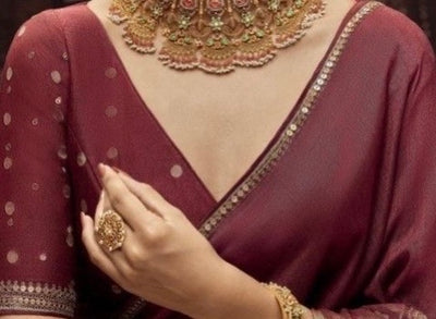 Deep V-Neck BlouseFor a more modern and bold look, deep neckline with or without back designs.